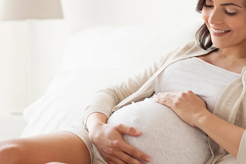 Happy Pregnant Woman - NU Fertility